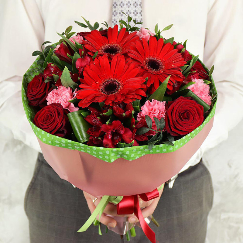 Bouquet of gerberas, roses and alstroemerias with pistachio leaves, standart