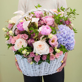 Basket with flowers "Touching surprise"