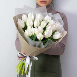 21 white tulips in designer packaging