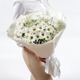 Bouquet of chrysanthemums and white gypsophila