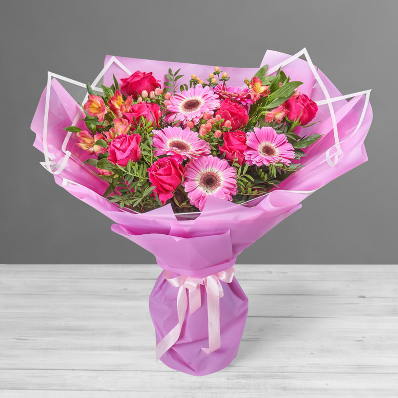 Bouquet of crimson roses, delicate gerberas and alstroemerias, standart
