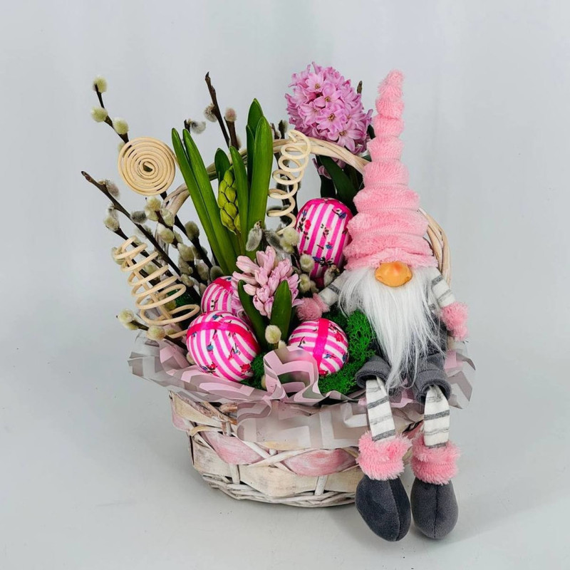 Interior composition of hyacinths and natural willow in a basket, standart