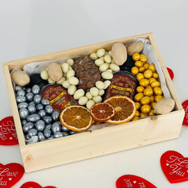 Gift bulk box with nuts in a wooden box