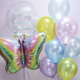 Set of balloons for a girl's birthday with a butterfly