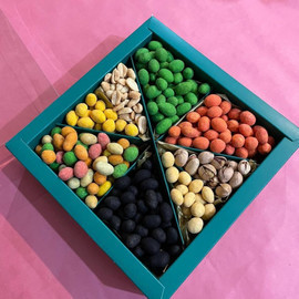 A set of snacks in a box as a gift