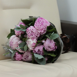 11 peonies Sarah Bernhardt with greenery in a designer package