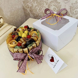 Bento cake with dried fruits and chocolates