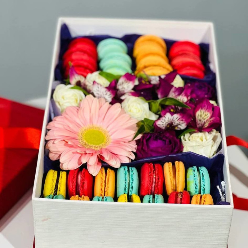 Macaroons with flowers in a gift box, standart