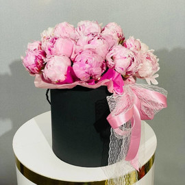 Box with fragrant peonies