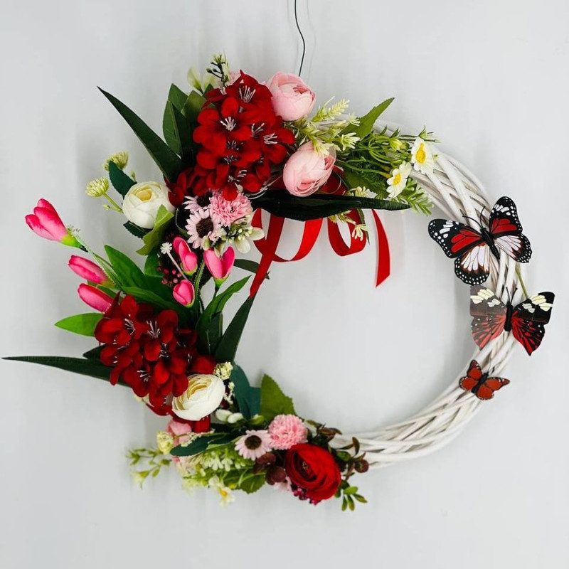 Easter wreath with artificial flowers for the front door, standart