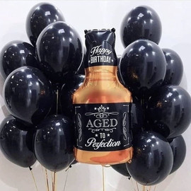A set of black balloons with helium for a man with a figure in the form of a bottle of whiskey