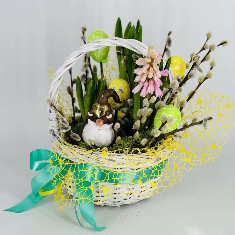 Easter basket with primroses and willow branches, standart