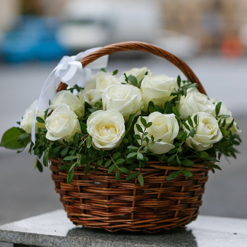 Basket of white roses in greenery, standart