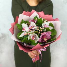 Bouquet of orchids and hypericum