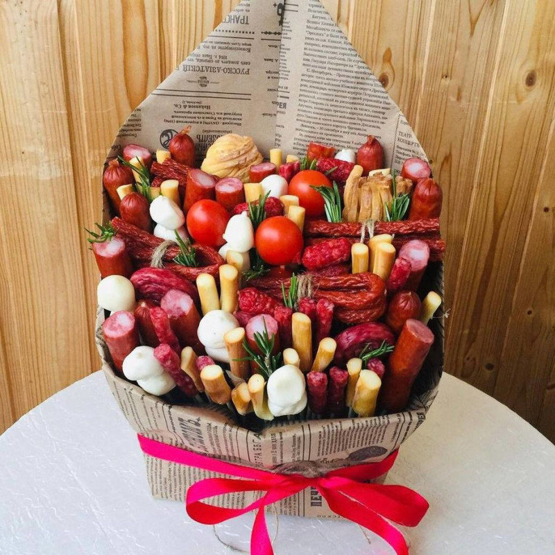 Bouquet in a newspaper with snacks, standart