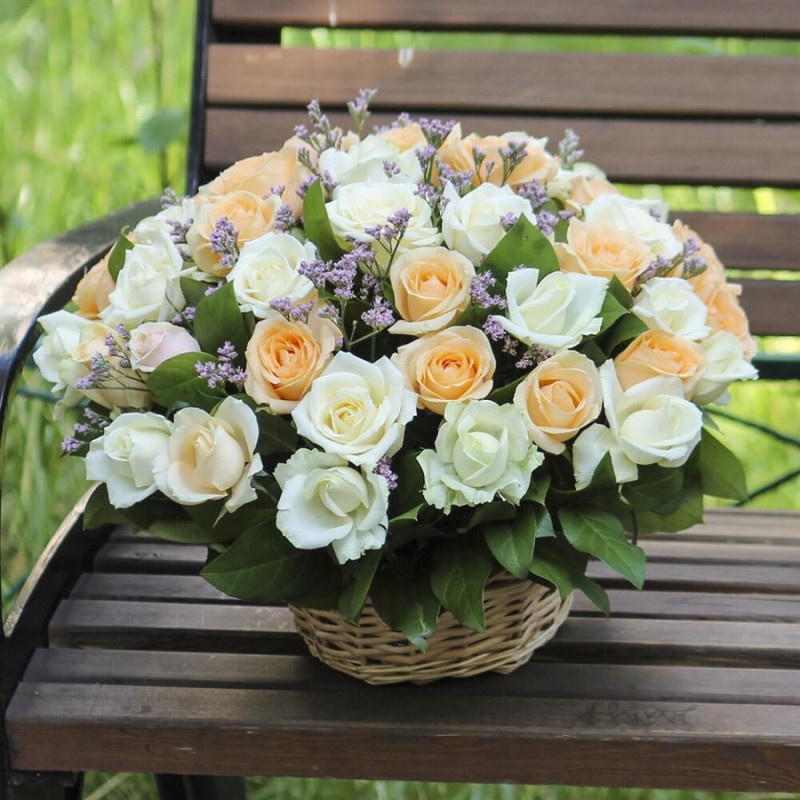 51 mix in a basket with white and cream rose greens, standart
