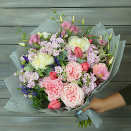 Bouquet of roses, tulips and peonies