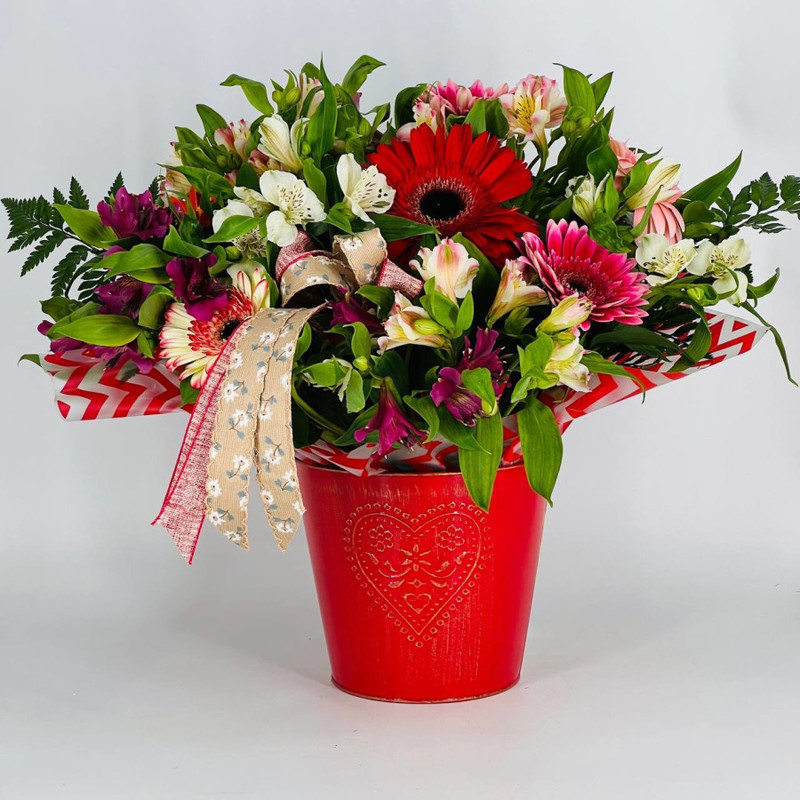 Bouquet of gerberas and alstroemerias in a bucket, standart
