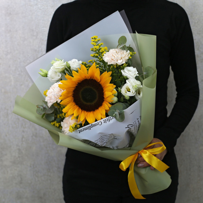 Bouquet of sunflower, cream carnation and white eustoma in designer packaging, standart