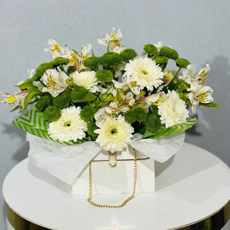 Bouquet of white gerberas and alstroemerias in a bag, standart