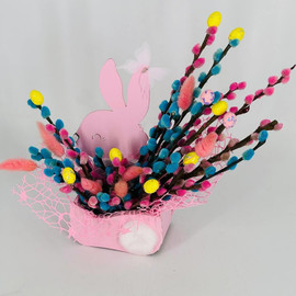 Bouquet of multi-colored willow in flower pots for Easter bunny