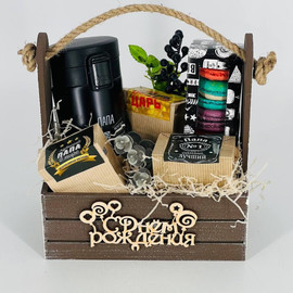 Gift set for dad: a bouquet of tea and coffee in a wooden box