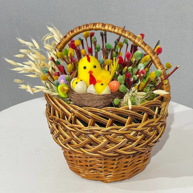 Easter basket with colorful live willow, standart