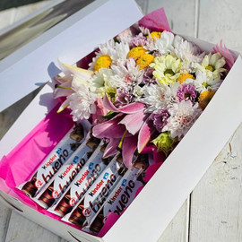 Sweet gift with flowers in a box