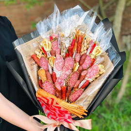 Bouquet of sausages and snacks
