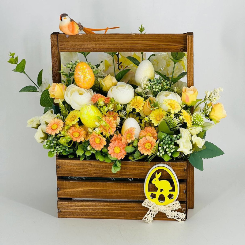 Easter design composition of artificial flowers in a wooden box, standart