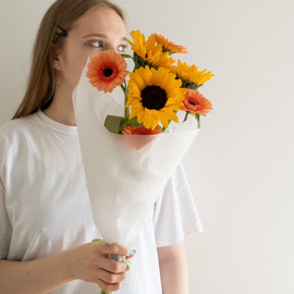 62. Bright summer bouquet of peach gerbera and yellow sunflowers