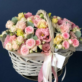 Basket with peony roses and eustoma