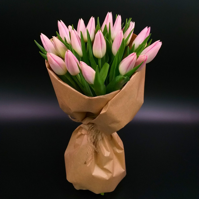 Bouquet of pink tulips in craft, standart