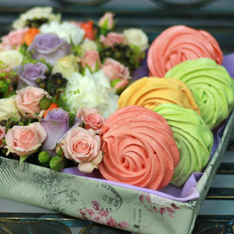 Composition of flowers and meringues in a square box, standart
