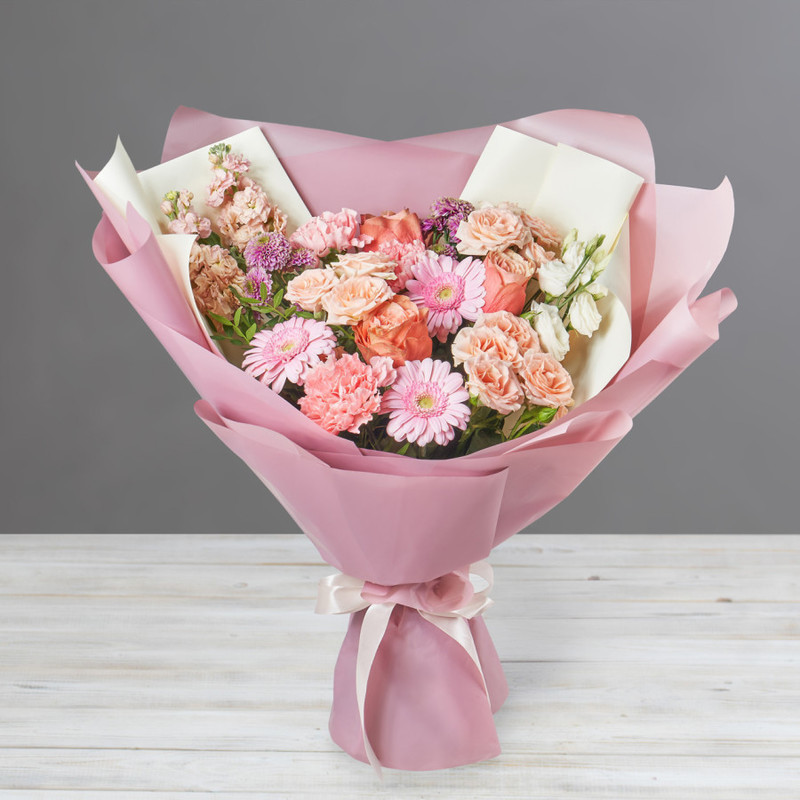 Bouquet of gerberas, roses and chrysanthemums in pink tones, standart