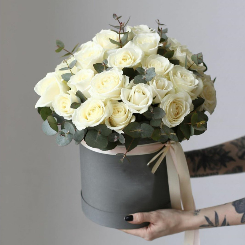 Box with white roses and eucalyptus, standart