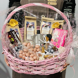 Coffee gift basket with a geyser coffee maker and sweets