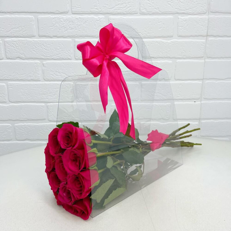 Bouquet of 11 pink roses Topas in a bag 50 cm, standart