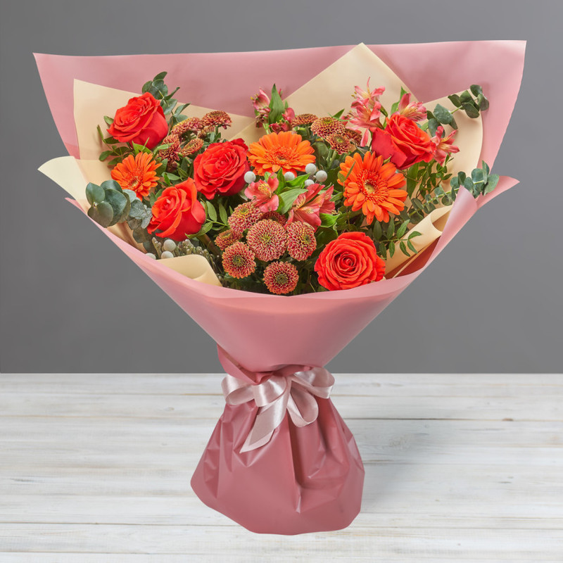 Bright bouquet of red gerberas, roses and alstroemerias, standart