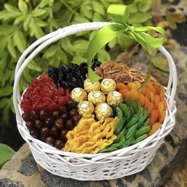 Basket with dried fruits and sweets