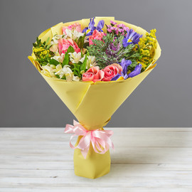 Bouquet of brassica, irises and santini