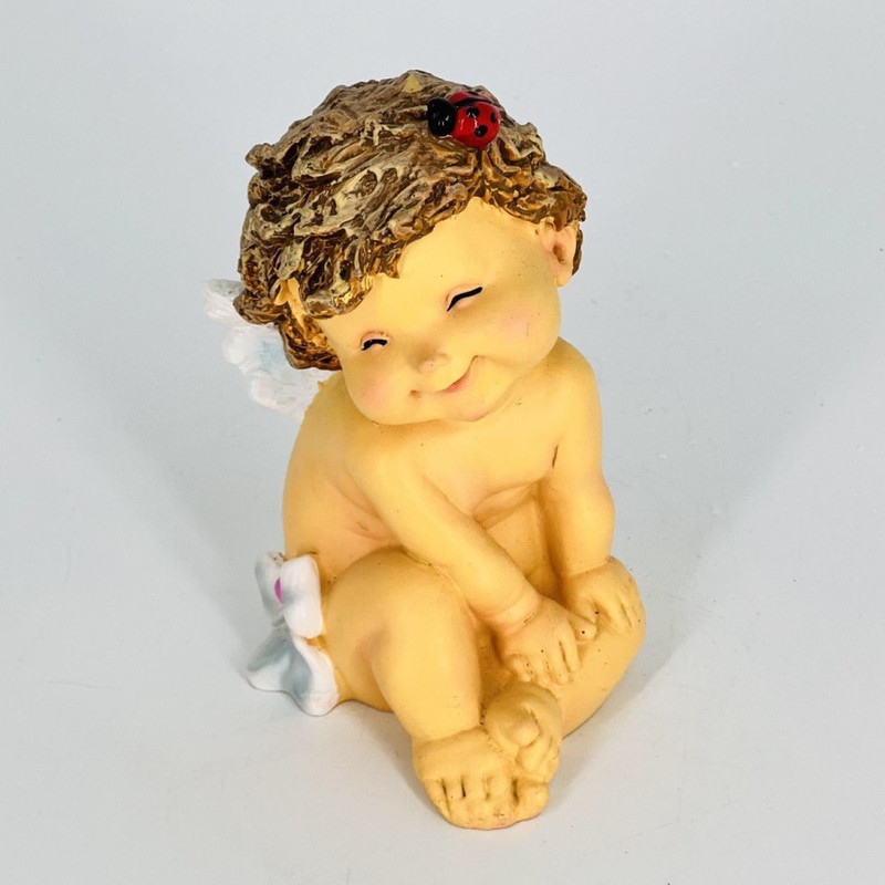 Souvenir figurine of an angel with a ladybug in her hair, standart