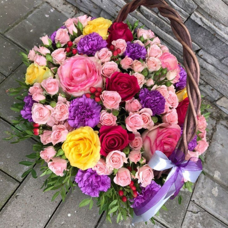 Basket of roses and carnations bright, standart
