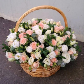 35 white roses and 15 white eustomas in a basket