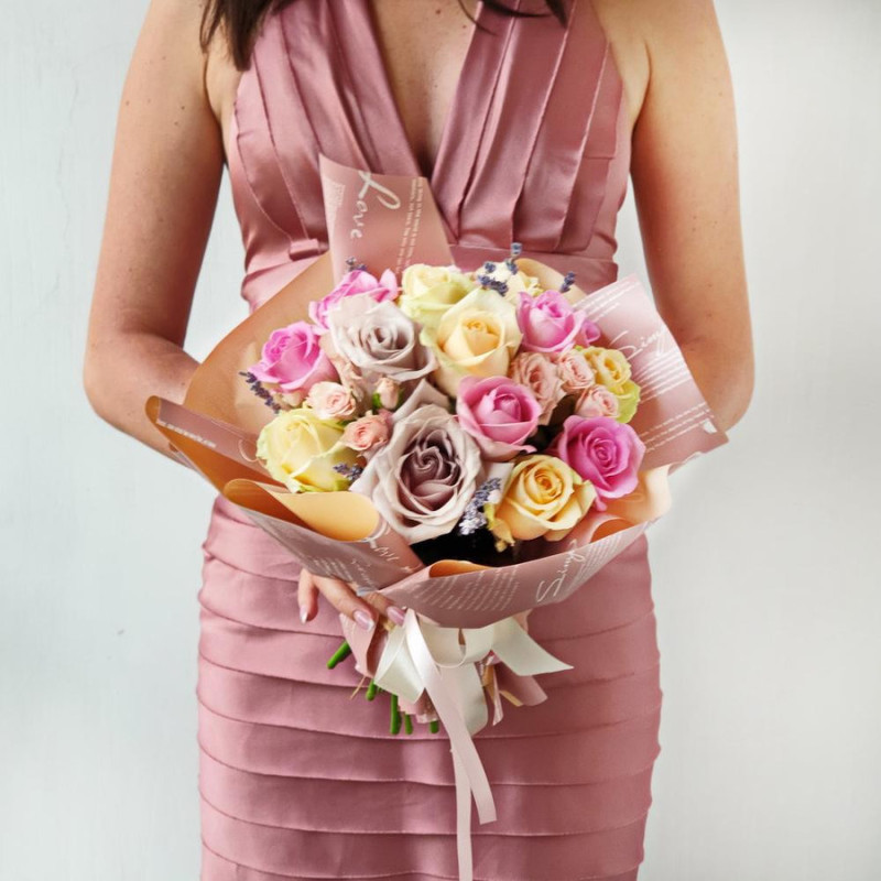 Lovely bouquet of delicate roses in original packaging, standart