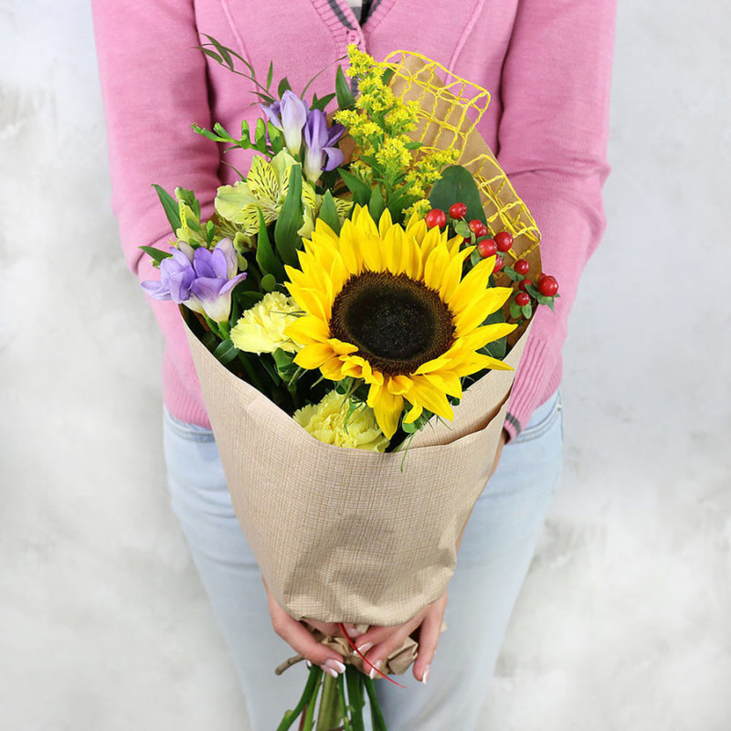 Bouquet of freesia alstroemeria and sunflower in Kraft, standart