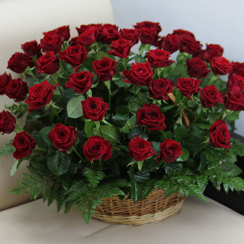 Basket of 51 roses "Red roses with greenery", standart