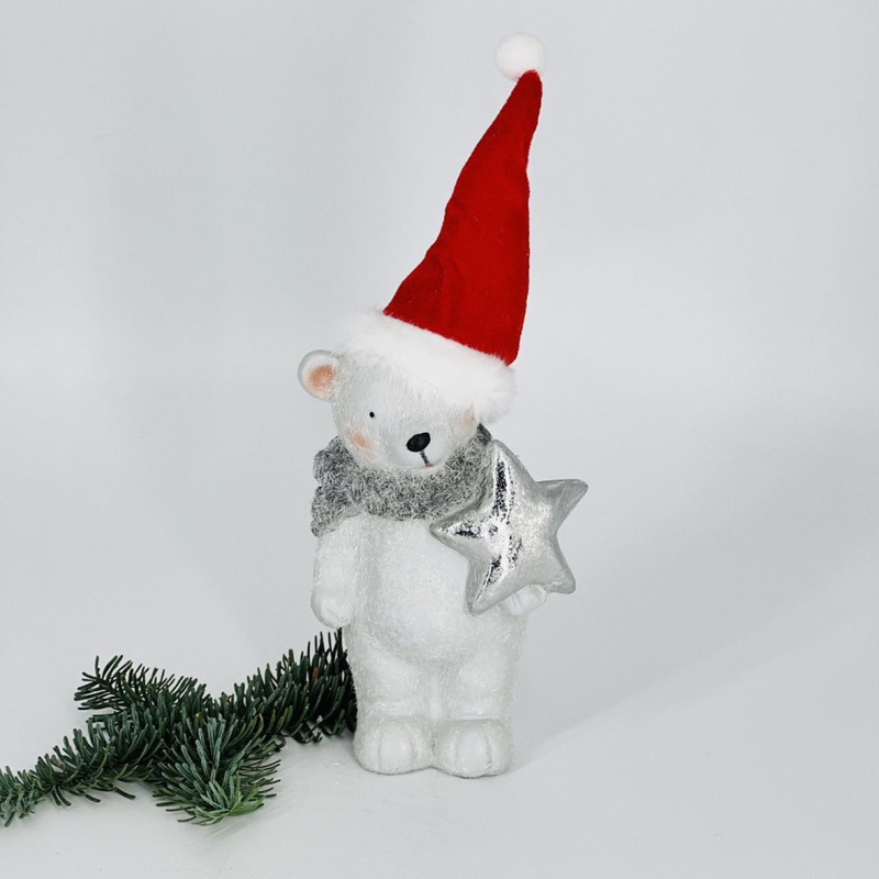 Handmade souvenir for the New Year polar bear in a red cap, standart