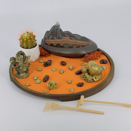 Tabletop Japanese rock garden with colored sand