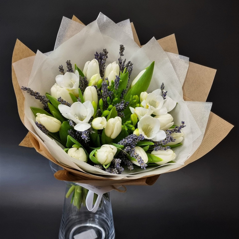 Bouquet of white tulips and fragrant freesia, standart